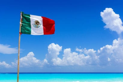 Mexico flag on beach