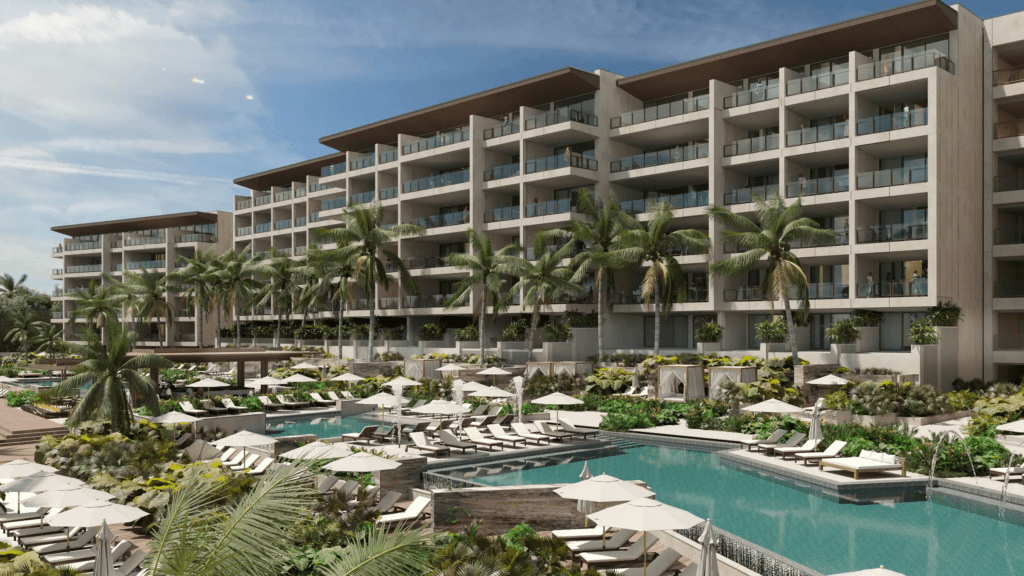 Park Hyatt Riviera Maya resort exterior with large outdoor pool, lounge chairs, and palm trees